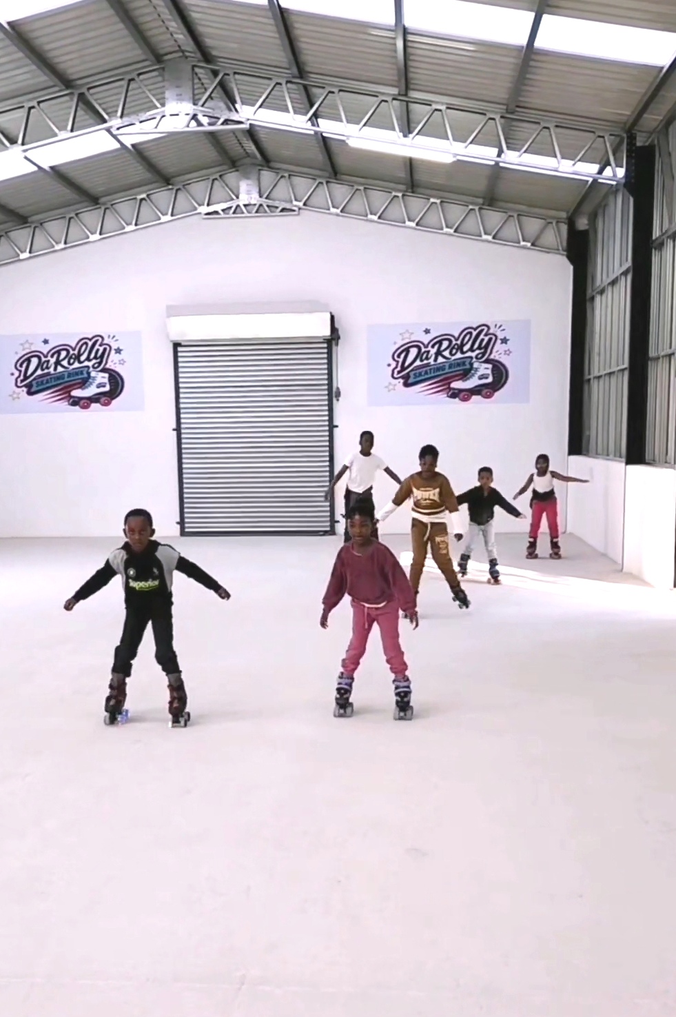 Kids learning to roller skate at Da Rolly